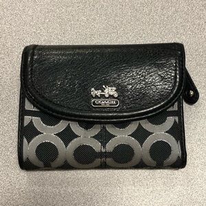 Black and grey trifold coach wallet
